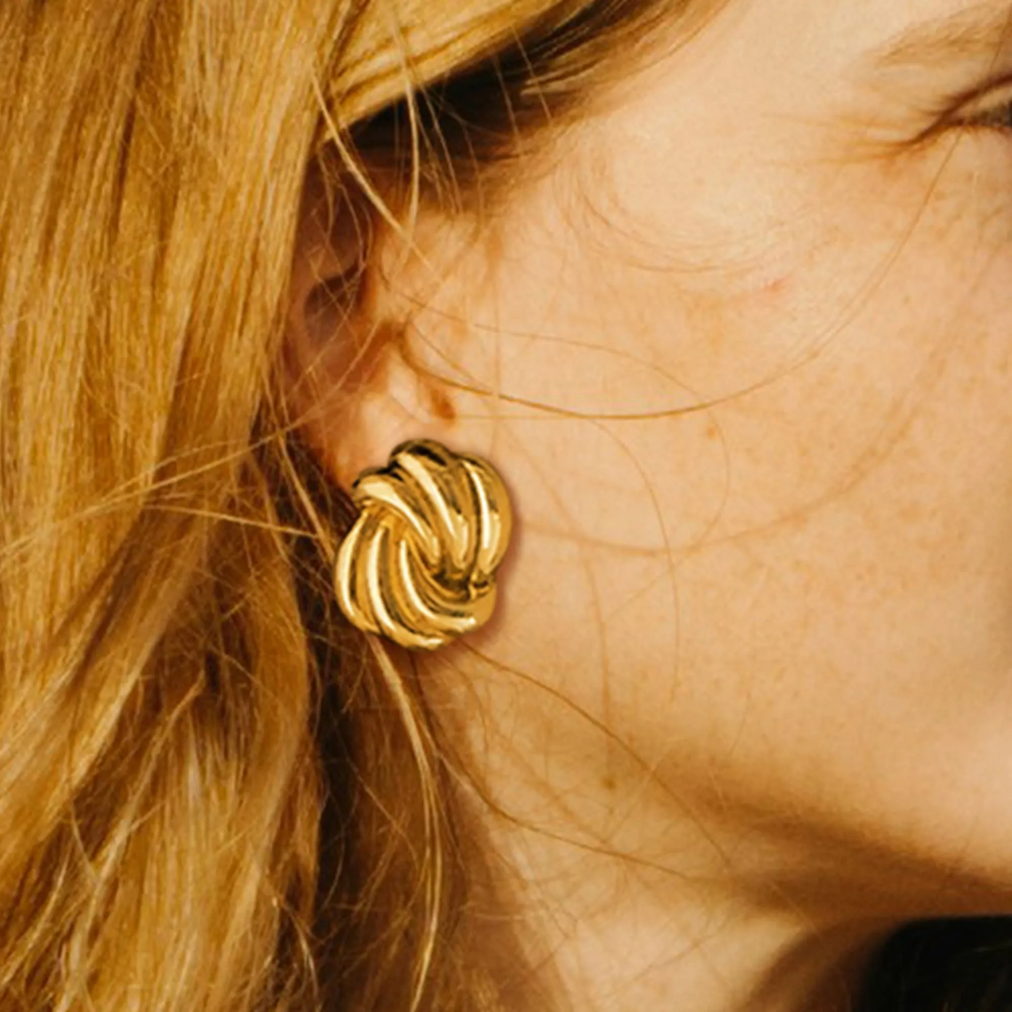 Intertwined Gold layered Stud Earrings